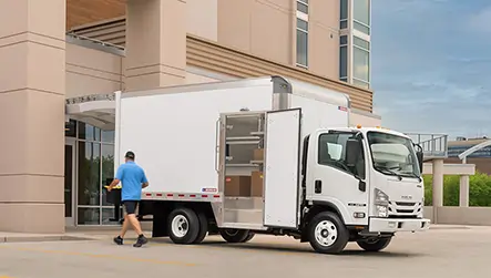 worker unloading morgan truck